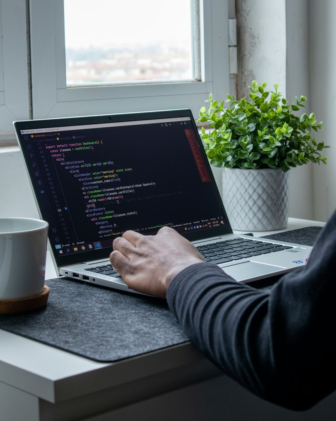 programmer writing insurance code